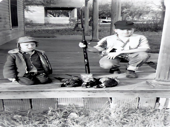 McGuire,Dennis (left) & McGuire, Richard At R.E. Allen original homestead (owned by Charles & Blanche McGuire)